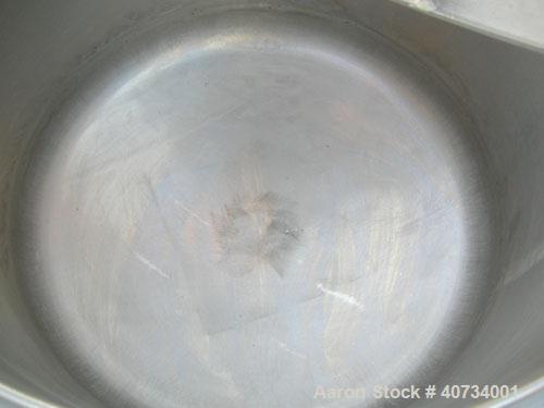 Used Gruber Tech Vacuum Mixer, model GS2000, 304 stainless steel. Dual stationary non-jacketed mixing cans, approximately 55 gallon, 500 pound capacity each. 28'' diameter x 24'' deep. Stainless stee...