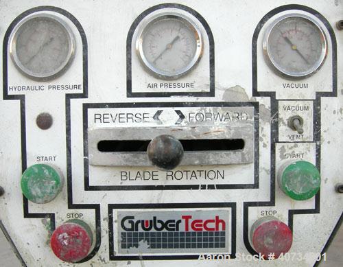 Used Gruber Tech Vacuum Mixer, model GS2000, 304 stainless steel. Dual stationary non-jacketed mixing cans, approximately 55 gallon, 500 pound capacity each. 28'' diameter x 24'' deep. Stainless stee...