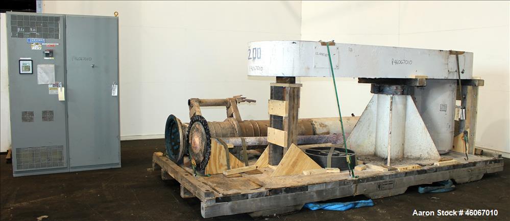Used Disperser. Approximately 4-1/2" diameter x 7' long 304 stainless steel shaft with 26" diameter mixing blade. Driven by 200 hp, 3/60/460 volt, 1780 rpm XP motor. Has Robicon control panel with AE...
