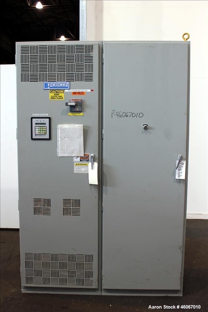 Used Disperser. Approximately 4-1/2" diameter x 7' long 304 stainless steel shaft with 26" diameter mixing blade. Driven by 200 hp, 3/60/460 volt, 1780 rpm XP motor. Has Robicon control panel with AE...
