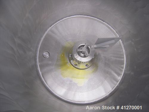 Used Kady Mill, Model 4A-C, 304 Stainless Steel. 250 gallon operating volume. 42" diameter x 50" deep stainless steel jacketed tank, rated up to 20 psi. Top 1/2 hinged cover with set in safety grate....