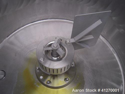 Used Kady Mill, Model 4A-C, 304 Stainless Steel. 250 gallon operating volume. 42" diameter x 50" deep stainless steel jacketed tank, rated up to 20 psi. Top 1/2 hinged cover with set in safety grate....