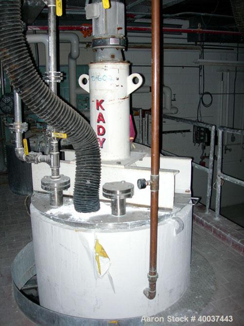 Used Kady Mill, Model 5C, 304 Stainless Steel. Approximately 300 gallon capacity. 42" diameter x 68" deep tank. 8" diameter bottom blade, driven by a 125 hp motor. Top entering agitator with sweep bl...