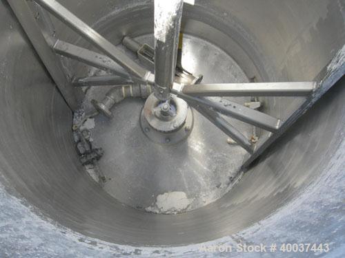Used Kady Mill, Model 5C, 304 Stainless Steel. Approximately 300 gallon capacity. 42" diameter x 68" deep tank. 8" diameter bottom blade, driven by a 125 hp motor. Top entering agitator with sweep bl...