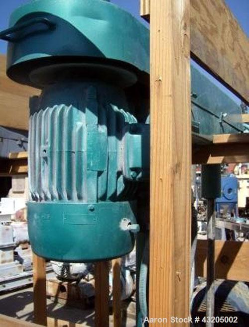 Used Mooney High Speed Disperser. 2’’ Diameter x 47’’ long stainless steel shaft with a 14’’ diameter blade. Driven by a 20hp, 3/60/230/460 volt, 1755 rpm motor. Manual speed control. Air/oil lift. P...