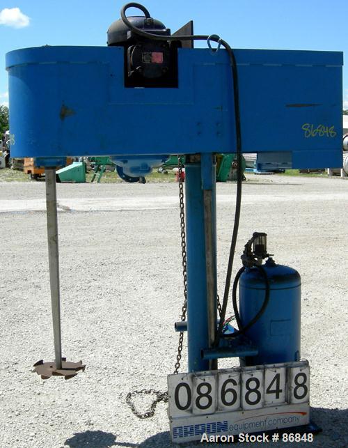 Used Disperser, 2" diameter x 42" long tapered 17-4PH stainless steel shaft with a 12" diameter carbon steel sawtooth blade. Will center in an approximate 48" diameter can. Air/oil lift. Hand operate...