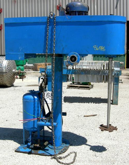 Used Disperser, 2" diameter x 42" long tapered 17-4PH stainless steel shaft with a 12" diameter carbon steel sawtooth blade. Will center in an approximate 48" diameter can. Air/oil lift. Hand operate...