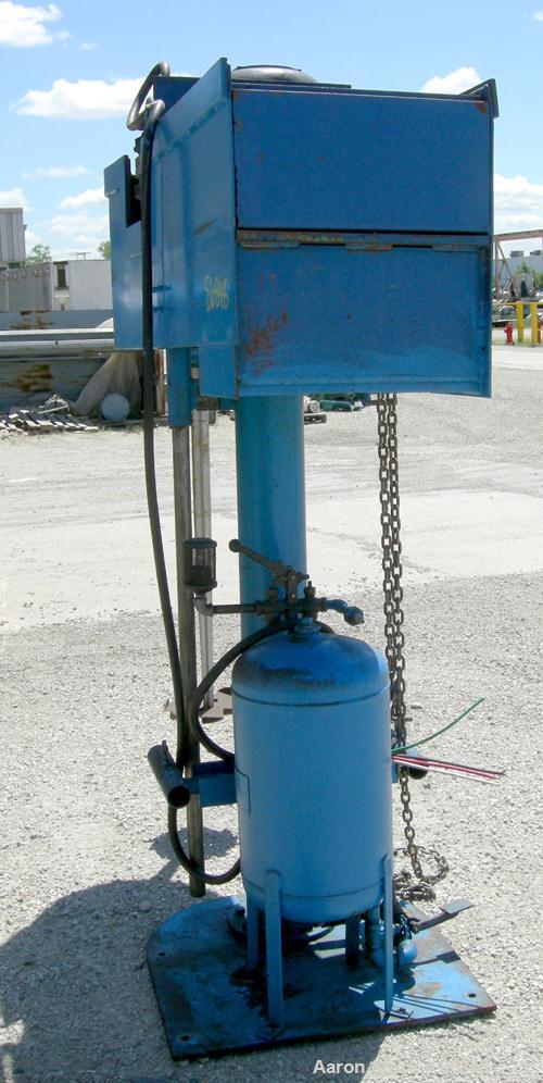 Used Disperser, 2" diameter x 42" long tapered 17-4PH stainless steel shaft with a 12" diameter carbon steel sawtooth blade. Will center in an approximate 48" diameter can. Air/oil lift. Hand operate...