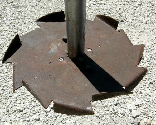 Used Disperser, 2" diameter x 42" long tapered 17-4PH stainless steel shaft with a 12" diameter carbon steel sawtooth blade. Will center in an approximate 48" diameter can. Air/oil lift. Hand operate...
