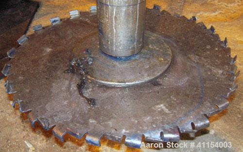 Used Schold Disperser. 3 1/2" diameter x 44" long shaft with an 18" diameter sawtooth blade. Will center in an approximate  50" diameter can. Air/oil lift. Hand operated variable speed drive, speed r...