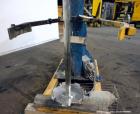 Used Bowers Disperser. 2-1/2” Diameter approximate 53” long 316 stainless steel shaft with a 304 stainless steel 18'' diameter saw tooth blade. Air/oil lift, adjustable tank holder. Driven by a 50hp,...