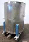 Used Bowers Disperser. 2-1/2” Diameter approximate 53” long 316 stainless steel shaft with a 304 stainless steel 18'' diameter saw tooth blade. Air/oil lift, adjustable tank holder. Driven by a 50hp,...