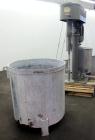 Used Hockmeyer Disperser, Model HV15. 2” Diameter x 41” long 304 stainless steel shaft with a 10” diameter saw tooth blade. Will center in an approximate 48” diameter can. 360 Degree rotation, 48