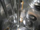 0Used-Myers 550/500A Tri-Shaft Mixer.  Includes (2) 160 gallon jacketed stainless steel tanks; hydraulic ram press for dispensing; 15 hp, 7.5 hp, 25 hp motors.  Unit has a hood and can operate in a v...