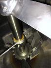 Used Schold Concentric Triple Shaft Tri-axial Disperser, 304 Stainless Steel. (1) High speed shear blade, driven by a 40 hp, 3/60/230/460 volt, 1800 rpm XP motor, speed range 0-1750 rpm, (1) Intermed...