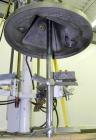 Used Schold Single Shaft Variable Low Speed Disperser, Model VLS 300. Approximately 2’’ diameter x 54
