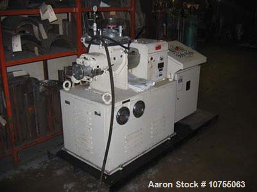 Used- AMK mixer extruder model VIV-4, 2.5" discharge screw, 208 volt operation at 60 hz, sigma jacketed stainless steel tang...