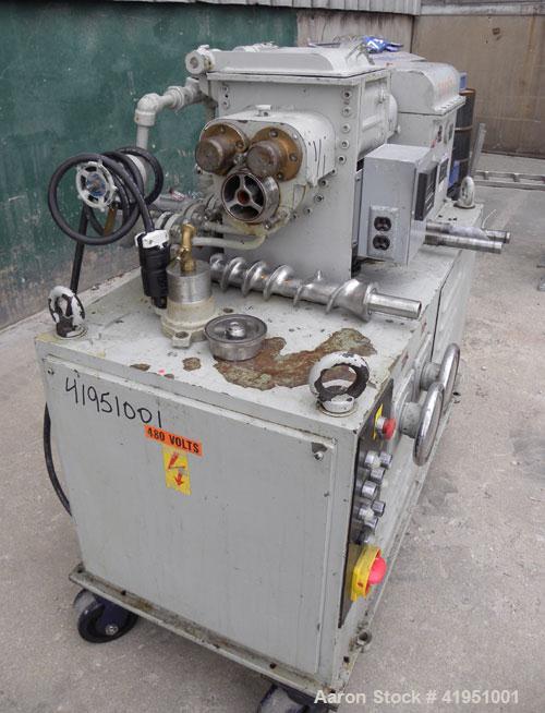 Used AMK Double Arm Mixtruder, approximately 1-1/2 gallon working capacity, 316 stainless steel. Carbon steel jacketed bowl, 7-7/8" left to right x 9" front to back x approximately 5" deep. Hinged to...