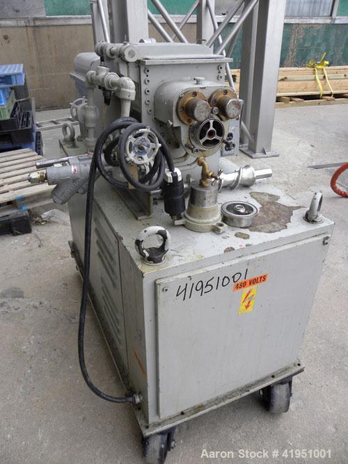 Used AMK Double Arm Mixtruder, approximately 1-1/2 gallon working capacity, 316 stainless steel. Carbon steel jacketed bowl, 7-7/8" left to right x 9" front to back x approximately 5" deep. Hinged to...