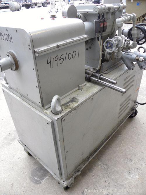 Used AMK Double Arm Mixtruder, approximately 1-1/2 gallon working capacity, 316 stainless steel. Carbon steel jacketed bowl, 7-7/8" left to right x 9" front to back x approximately 5" deep. Hinged to...