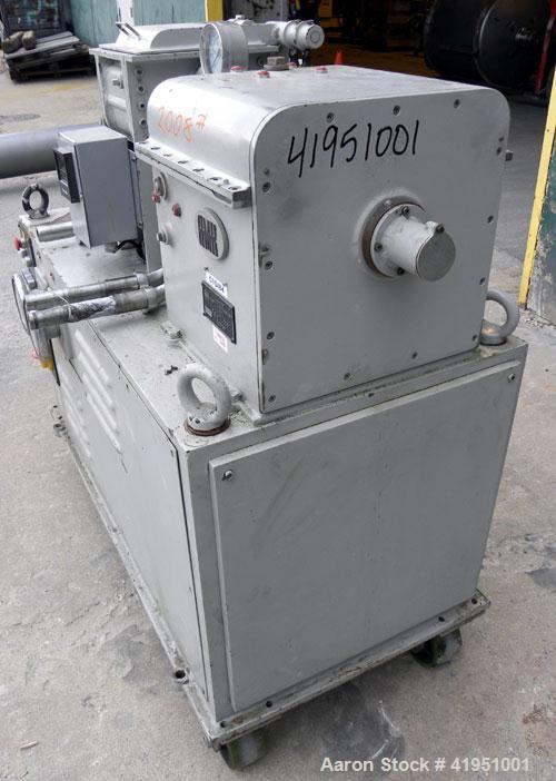 Used AMK Double Arm Mixtruder, approximately 1-1/2 gallon working capacity, 316 stainless steel. Carbon steel jacketed bowl, 7-7/8" left to right x 9" front to back x approximately 5" deep. Hinged to...