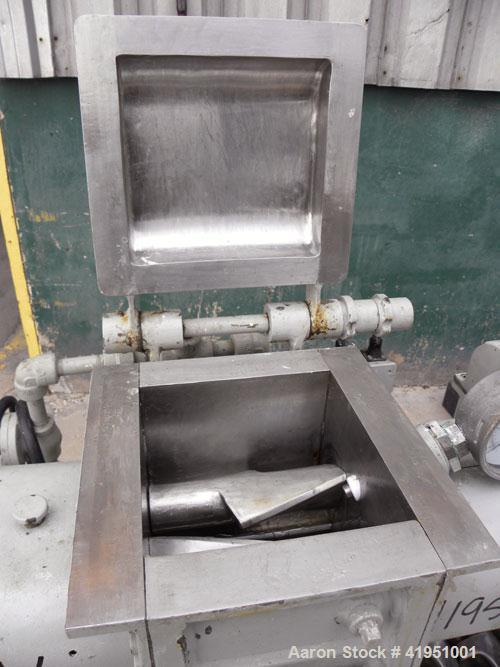 Used AMK Double Arm Mixtruder, approximately 1-1/2 gallon working capacity, 316 stainless steel. Carbon steel jacketed bowl, 7-7/8" left to right x 9" front to back x approximately 5" deep. Hinged to...