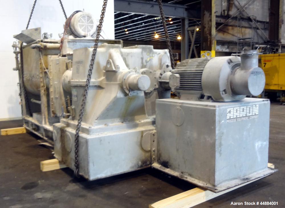 Used Aaron Process 500 Gallon Mixer Extruder, Model MX 500.  Carbon steel construction.  200 Hp main drive.