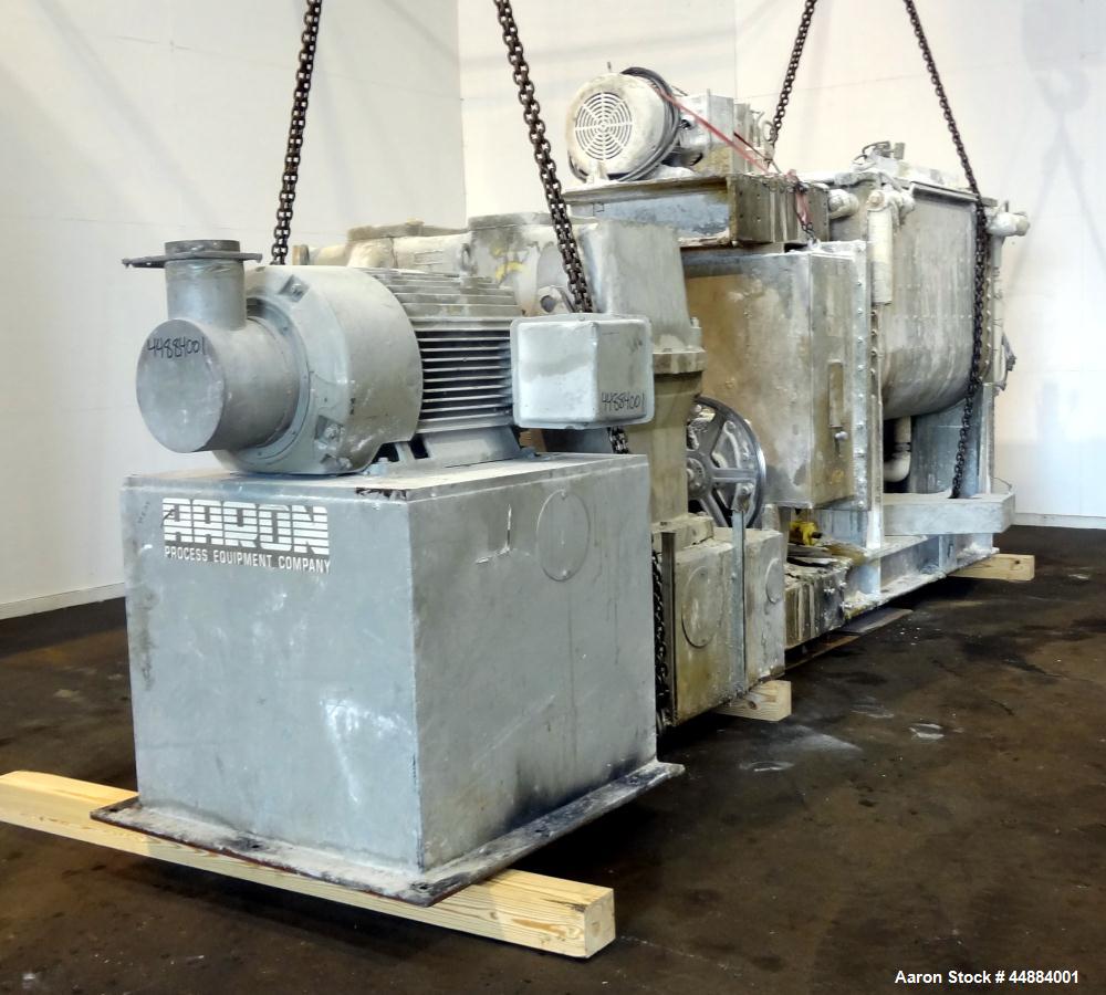 Used Aaron Process 500 Gallon Mixer Extruder, Model MX 500.  Carbon steel construction.  200 Hp main drive.