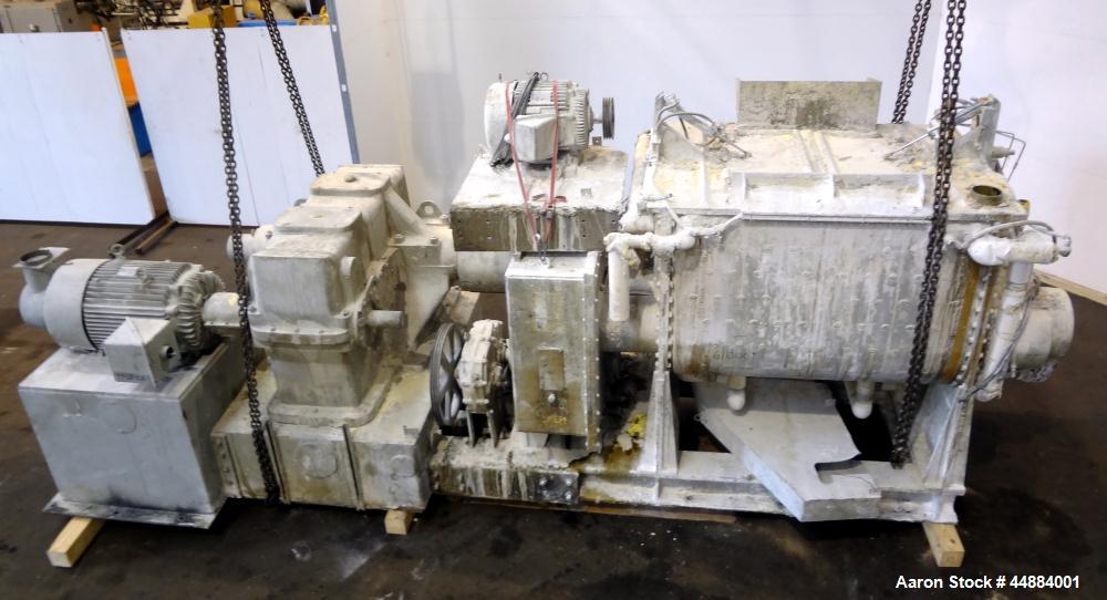 Used Aaron Process 500 Gallon Mixer Extruder, Model MX 500.  Carbon steel construction.  200 Hp main drive.