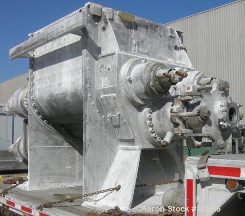 USED: Baker Perkins/Guittard Mixer/Extruder. 300 gallon working capacity, 600 total, type MHE160SL, 304 stainless steel. 304 stainless steel jacketed bowl 54-3/4" front to back x 55" left to right x ...
