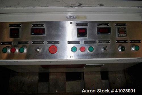 Used Jaygo Baker Perkins Model AME-7 Double Arm Sigma Mixer Extruder. Manufactured 1997. Unit features approximately 2 gallon working capacity, 7 1/2" long x 7" wide x 7" deep mix trough, stainless s...