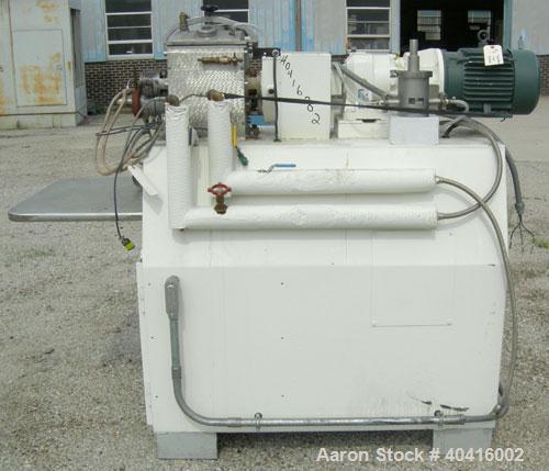 Used Baker Perkins/Guittard lab size mixer extruder, model LEX8.  Approximately 1.33 gallon working capacity, 2.125 total, 304 stainless steel.  Jacketed bowl, 8 3/4" left to right x 8 1/2" front to ...