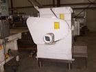 Unused-Used: Approximately 75 gallon food grade double arm mixer/extruder. Bowl dimensions: 27