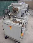 Used AMK Double Arm Mixtruder, approximately 1-1/2 gallon working capacity, 316 stainless steel. Carbon steel jacketed bowl, 7-7/8