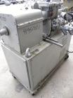 Used AMK Double Arm Mixtruder, approximately 1-1/2 gallon working capacity, 316 stainless steel. Carbon steel jacketed bowl, 7-7/8