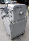 Used AMK Double Arm Mixtruder, approximately 1-1/2 gallon working capacity, 316 stainless steel. Carbon steel jacketed bowl, 7-7/8