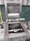 Used AMK Double Arm Mixtruder, approximately 1-1/2 gallon working capacity, 316 stainless steel. Carbon steel jacketed bowl, 7-7/8
