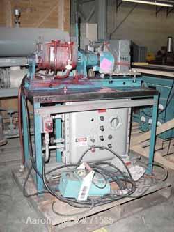 USED:Aaron Process Machinery double arm mixer 14L, 2 gallon workingcapacity (7.5 liters), 3.7 gallon total capacity (14 liters).Jacketed bowl. 11" left to right x 9-1/8" front to back x approx 7"deep...