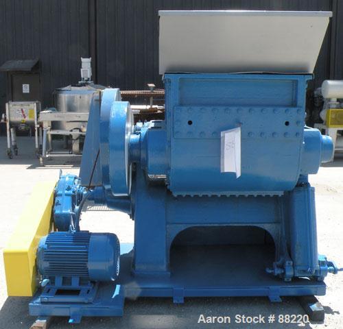 Used Baker Perkins Double Arm Mixer, Model 15, 100 Gallon Capacity, Carbon Steel. Jacketed bowl 33" left to right x 38" front to back x approximately 30" deep, Tangential sigma blades, geared one end...