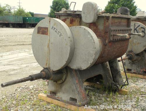 Used Baker Perkins Double Arm Mixer, Model 15, 100 Gallon Capacity, Carbon Steel.  Jacketed bowl 33" left to right x 38" front to back x approximately 30" deep. Tangential sigma blades, geared one en...