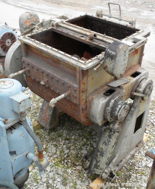 Used Baker Perkins Double Arm Mixer, Model 15, 100 Gallon Capacity, Carbon Steel.  Jacketed bowl 33" left to right x 38" front to back x approximately 30" deep. Tangential sigma blades, geared one en...