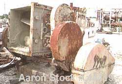 USED:Baker Perkins size 15G1M double arm mixer. 100 gallon workingcapacity. Carbon steel. Jacketed 150 psi @ 650 deg F. Bowl 33" L-R x37 1/2" F-B x 31" DP. Sigma blades - tangential. Standard packing...