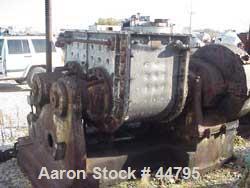 USED:Baker Perkins 100 gal double arm mixer. Stainless steel.Jacketed bowl and ends (est 80 psi). Bowl 28" L-R x 43" F-B, approx38" deep. Dispersion blades tangential. Geared one end. Screw tiltw/app...