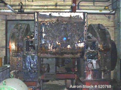 USED: Baker Perkins sigma blade mixer, 400 gallon, carbon steel. Tangential blades, hot oil jacket, 60 hp main drive, bottom dump discharge.