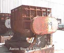 USED: Baker Perkins 500 gallon double arm mixer. Stainless steel interior, carbon steel duplex blades with serrated edges, geared at one end, carbon steel, jacketed bowl 64" left-right x 60" front-ba...
