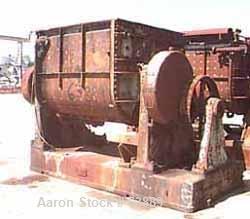 USED: Baker Perkins 500 gallon double arm mixer. Stainless steel interior, carbon steel duplex blades with serrated edges, geared at one end, carbon steel, jacketed bowl 64" left-right x 60" front-ba...