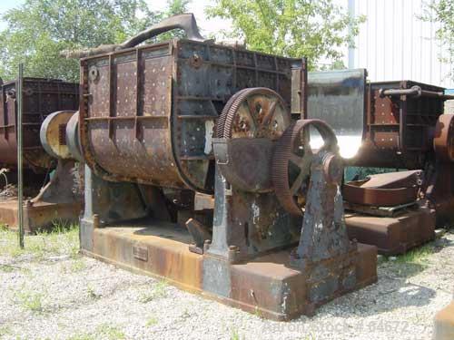 USED: Baker Perkins 500 Gallon Double Arm Mixer. Stainless steel trough, carbon steel jacket on trough and sides. Bowl 64" left-right x 59" front-back x 54" deep, carbon steel duplex blades with serr...
