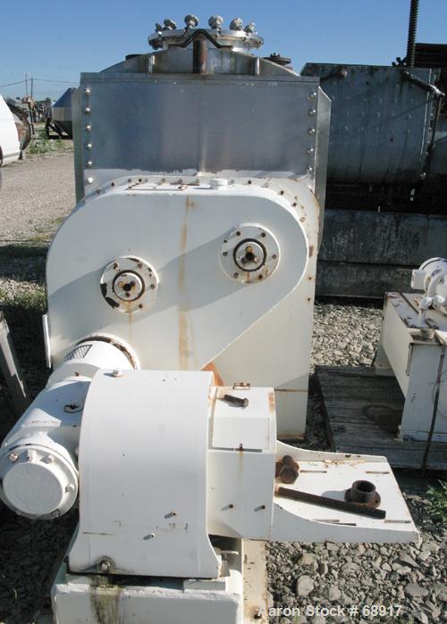 USED: Day double arm mixer, split level design, 150 gallon working, 235 total. 304 stainless steel insulated and jacketed bowl rated for vacuum 25 NC psi at 353 deg F. 36" left to right x 39-1/2" fro...