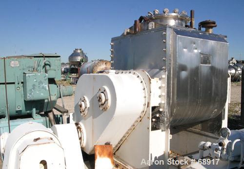 USED: Day double arm mixer, split level design, 150 gallon working, 235 total. 304 stainless steel insulated and jacketed bowl rated for vacuum 25 NC psi at 353 deg F. 36" left to right x 39-1/2" fro...