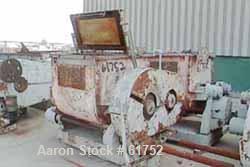 USED: Readco type P.M. 100 gallon double arm mixer. Carbon steel,jacketed, tangential sigma blades geared one end. Bowl measures 31"left to right, 38" front to back, 30" deep. Flat bolt down top cove...